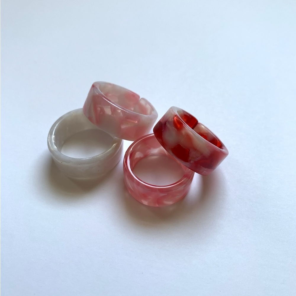 Set of Four Marbled Resin Rings with 2 sets of matching Earrings